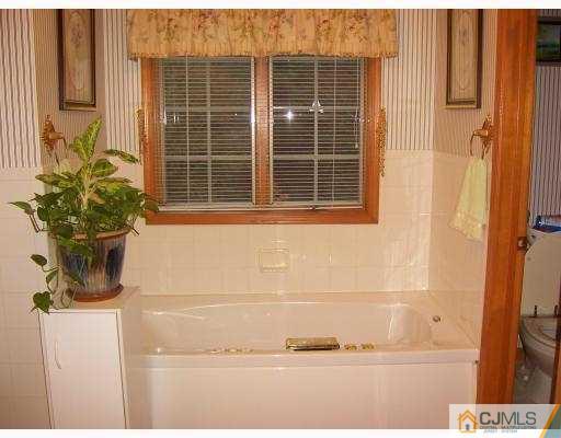3 Maher Road Somerset, NJ 08873 - Photo 8 of 8 a bathroom with a shower