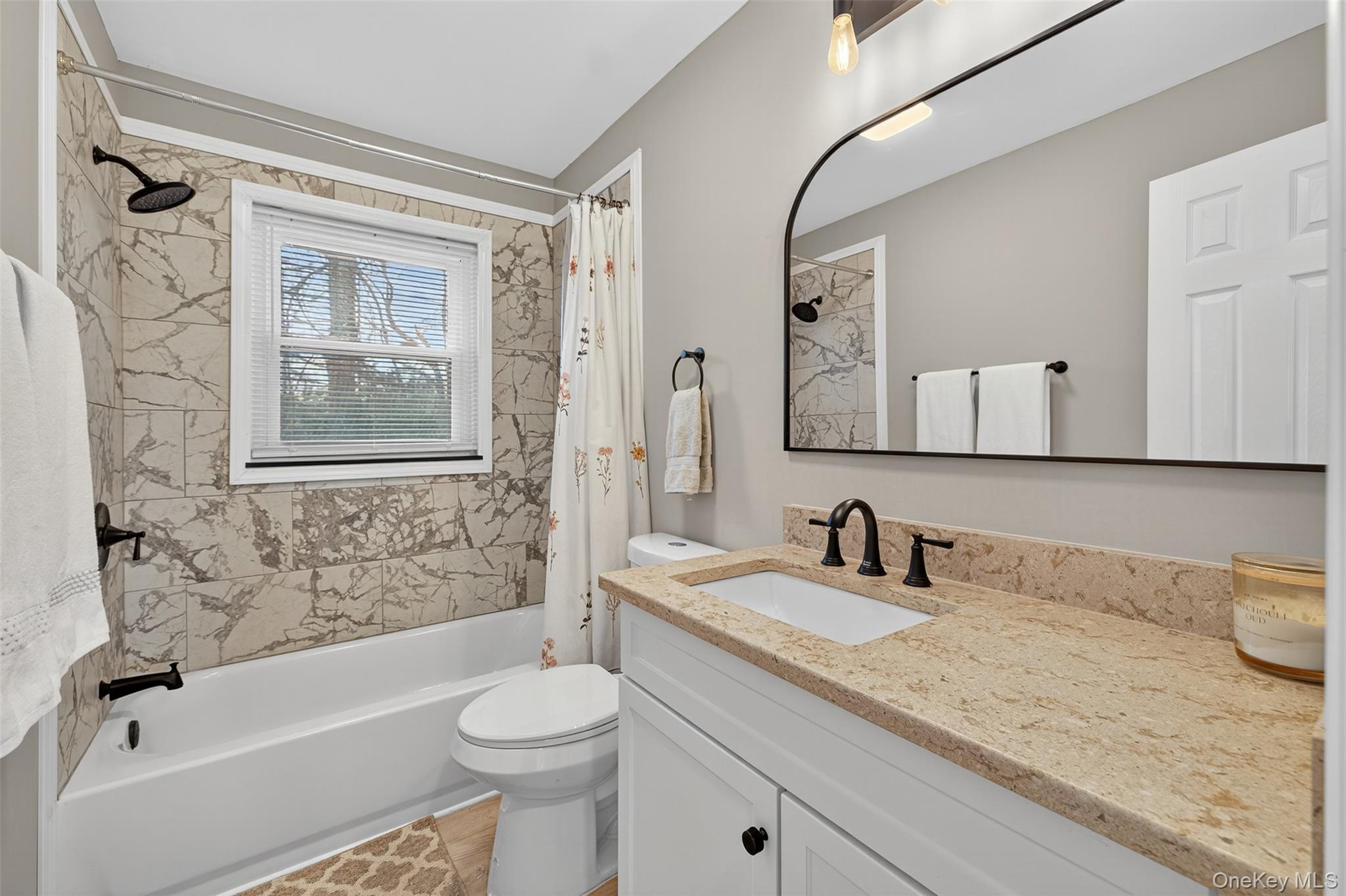34 Round Hill Road Walden, NY 12586 - Photo 11 of 18 a bathroom with a granite countertop sink toilet and shower