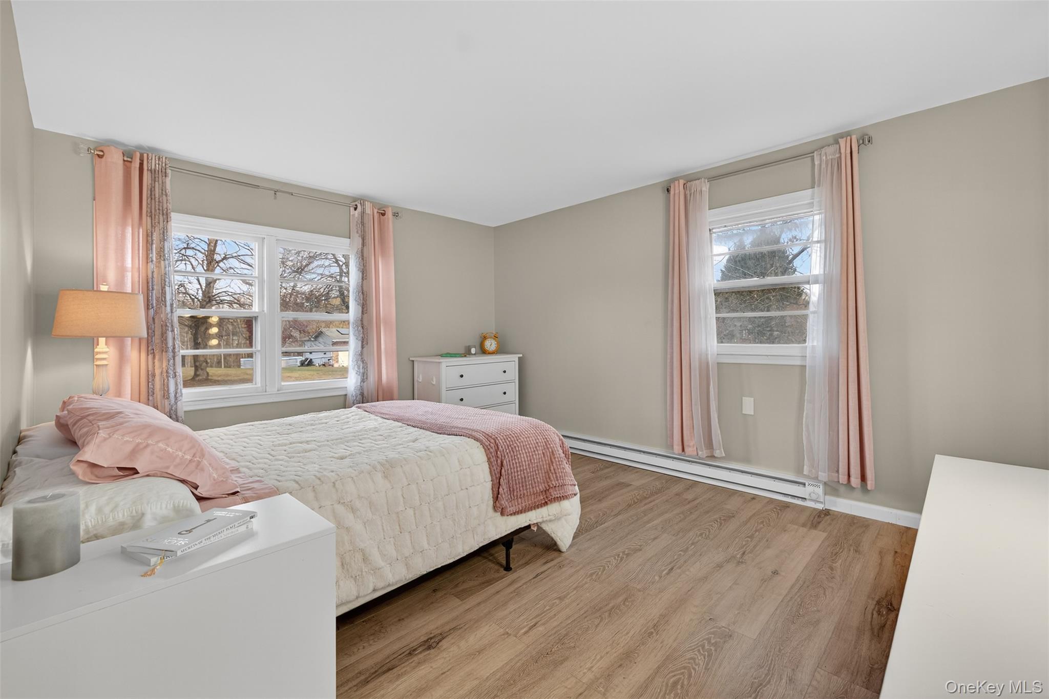 34 Round Hill Road Walden, NY 12586 - Photo 12 of 18 a bedroom with a large bed and a window