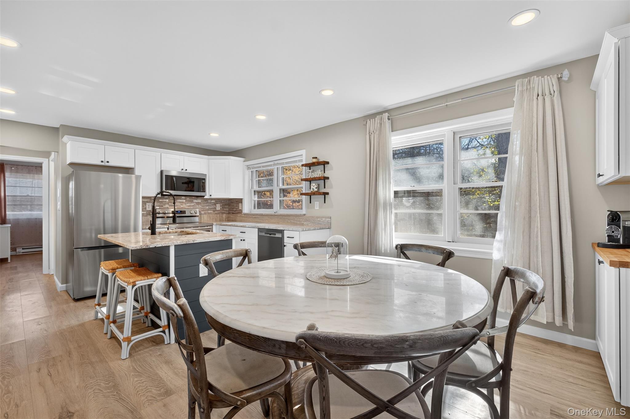 34 Round Hill Road Walden, NY 12586 - Photo 7 of 18 a view of a dining room with furniture and wooden floor