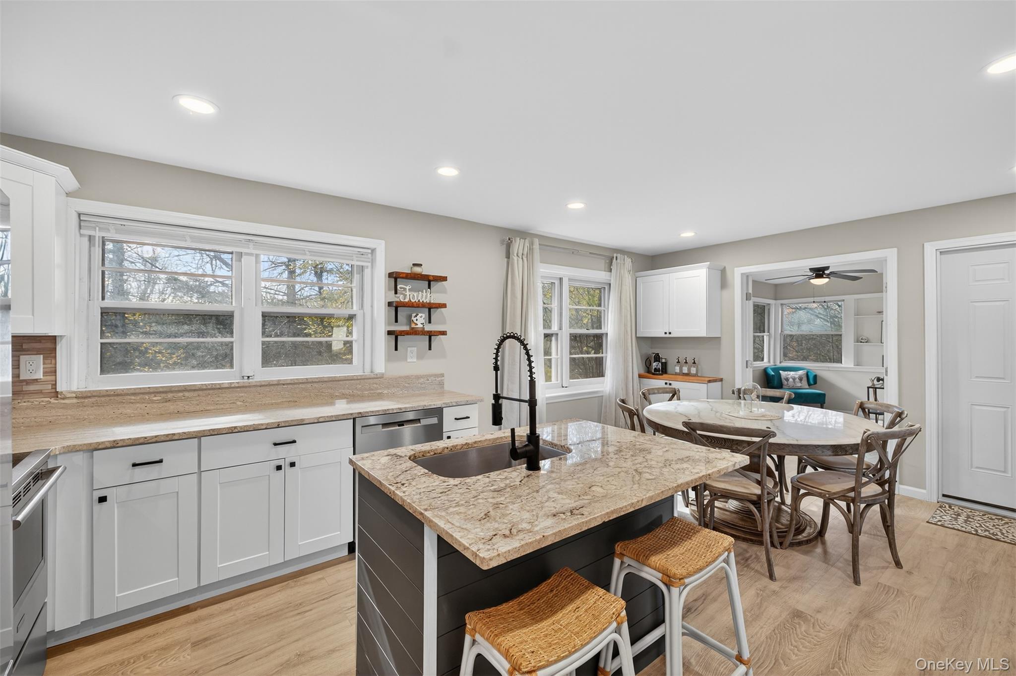 34 Round Hill Road Walden, NY 12586 - Photo 9 of 18 a view of a kitchen area with furniture and wooden floor