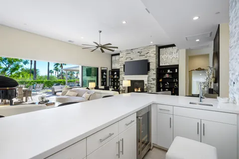 a view of an chairs and tables in the patio