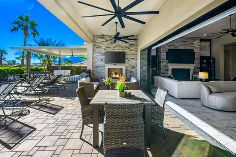 a bedroom with a bed and a fireplace