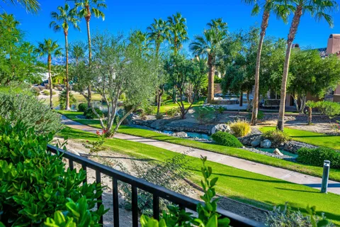 a bathroom with a sink a mirror and a shower