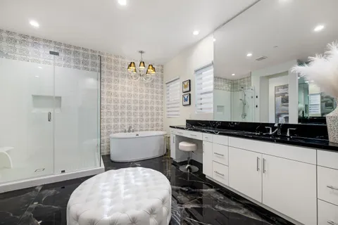 a bathroom with a sink and a washing machine