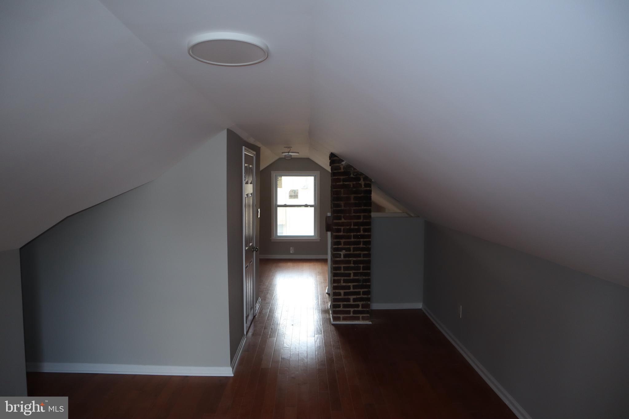 1004 Shepherd Street Northeast Washington, DC 20017 - Photo 20 of 28 a view of hallway with wooden floor