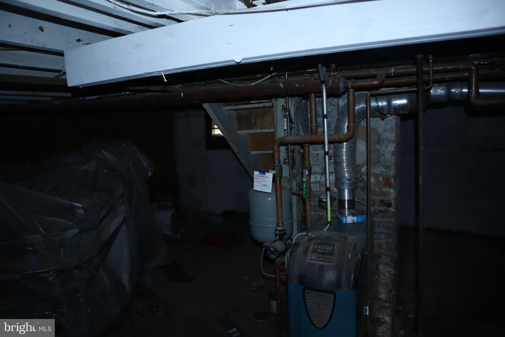 1004 Shepherd Street Northeast Washington, DC 20017 - Photo 25 of 28 a close view of water heater room