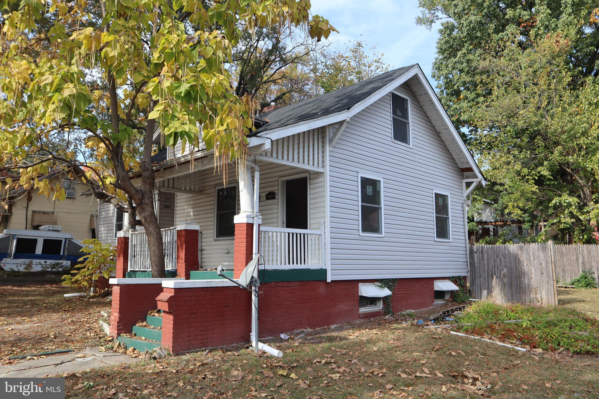 1004 Shepherd Street Northeast Washington, DC 20017 - Photo 3 of 28 a view of a house with a yard