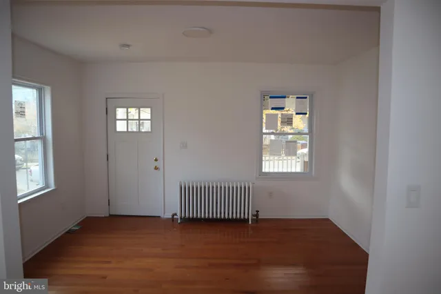 an empty room with windows