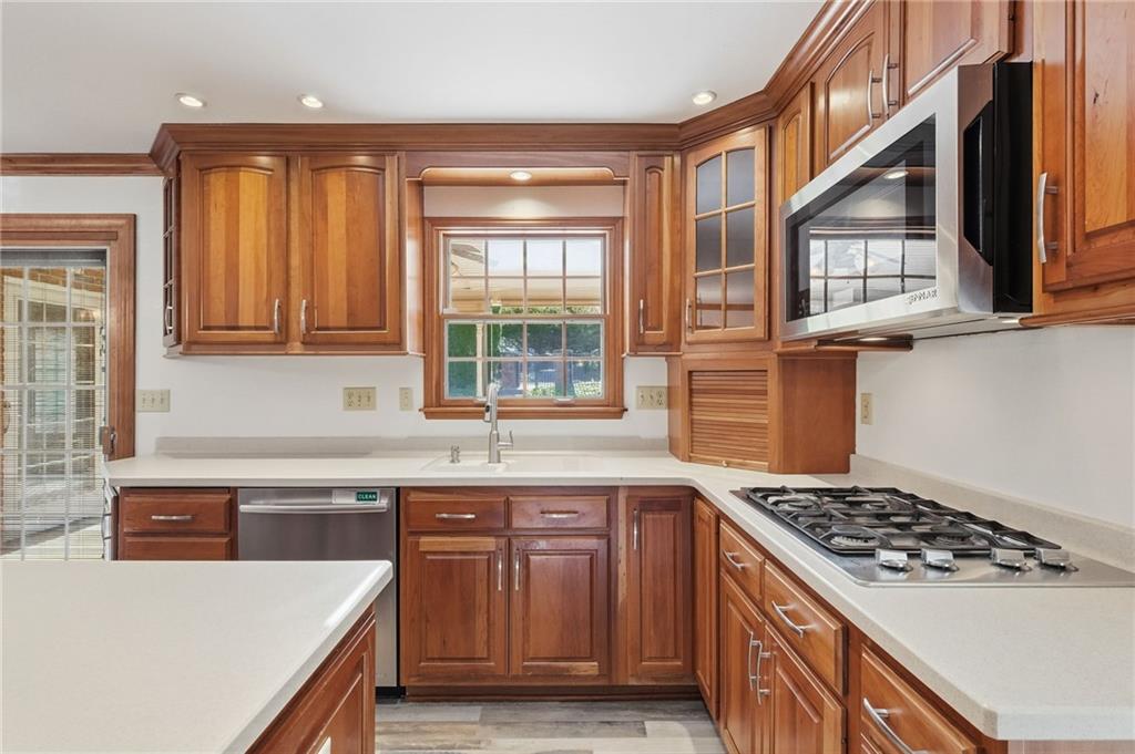 120 Timothy Road Gibsonia, PA 15044 - Photo 18 of 50 a kitchen with stainless steel appliances granite countertop a stove a sink and a microwave