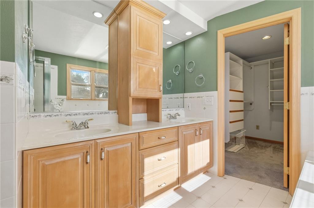 120 Timothy Road Gibsonia, PA 15044 - Photo 29 of 50 a spacious bathroom with a granite countertop sink mirror and a