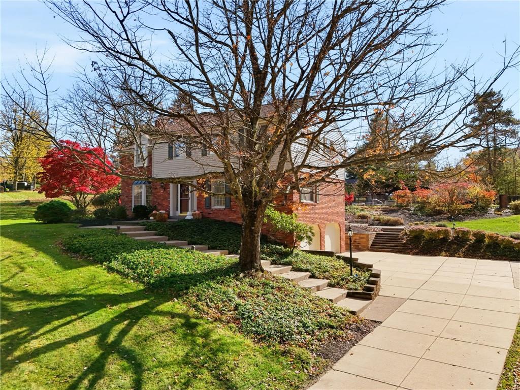 120 Timothy Road Gibsonia, PA 15044 - Photo 4 of 50 a front view of a house with garden