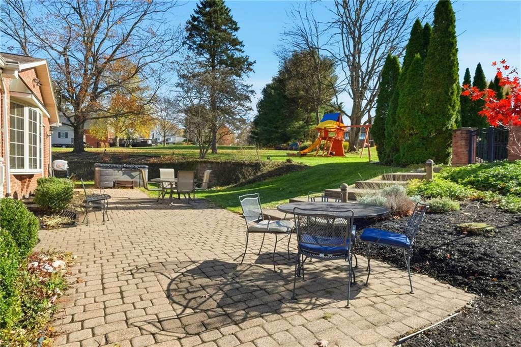 120 Timothy Road Gibsonia, PA 15044 - Photo 43 of 50 a swimming pool with outdoor seating and trees