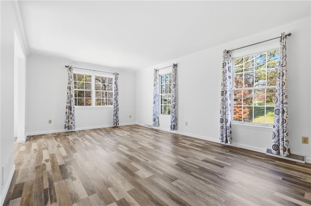 120 Timothy Road Gibsonia, PA 15044 - Photo 8 of 50 a view of empty room with wooden floor and fan