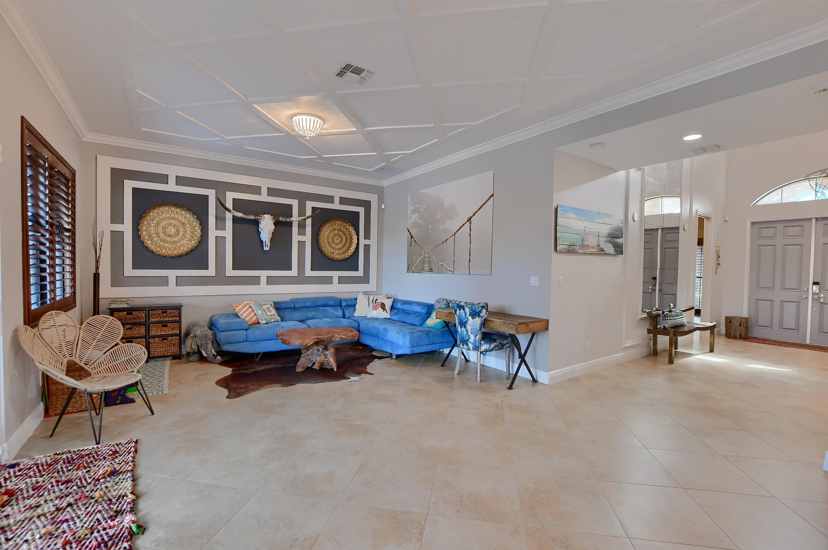 12161 Boca Reserve Lane Boca Raton, FL 33428 - Photo 12 of 53 a living room with furniture and a large window