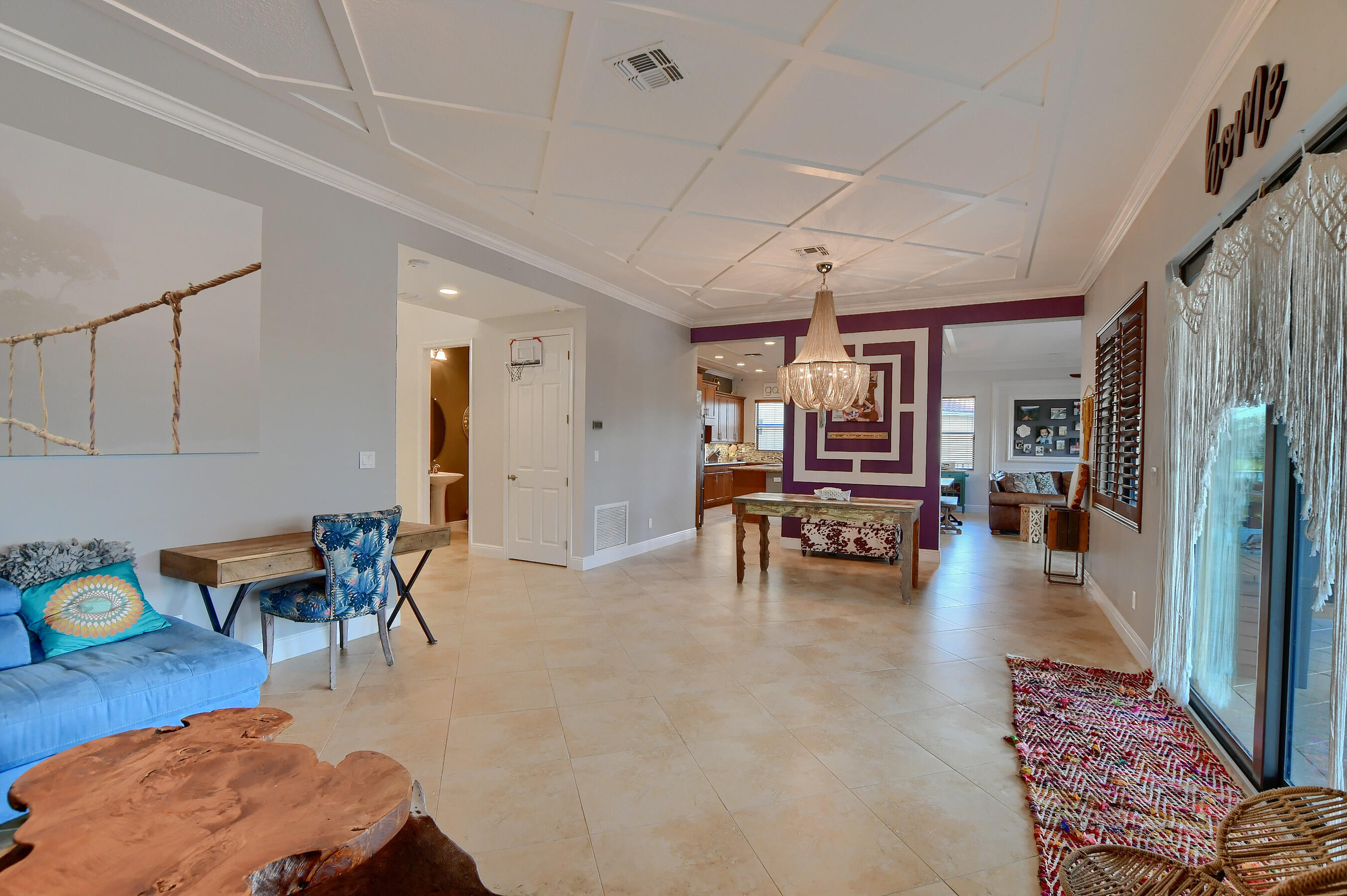 12161 Boca Reserve Lane Boca Raton, FL 33428 - Photo 13 of 53 a living room with furniture and kitchen view