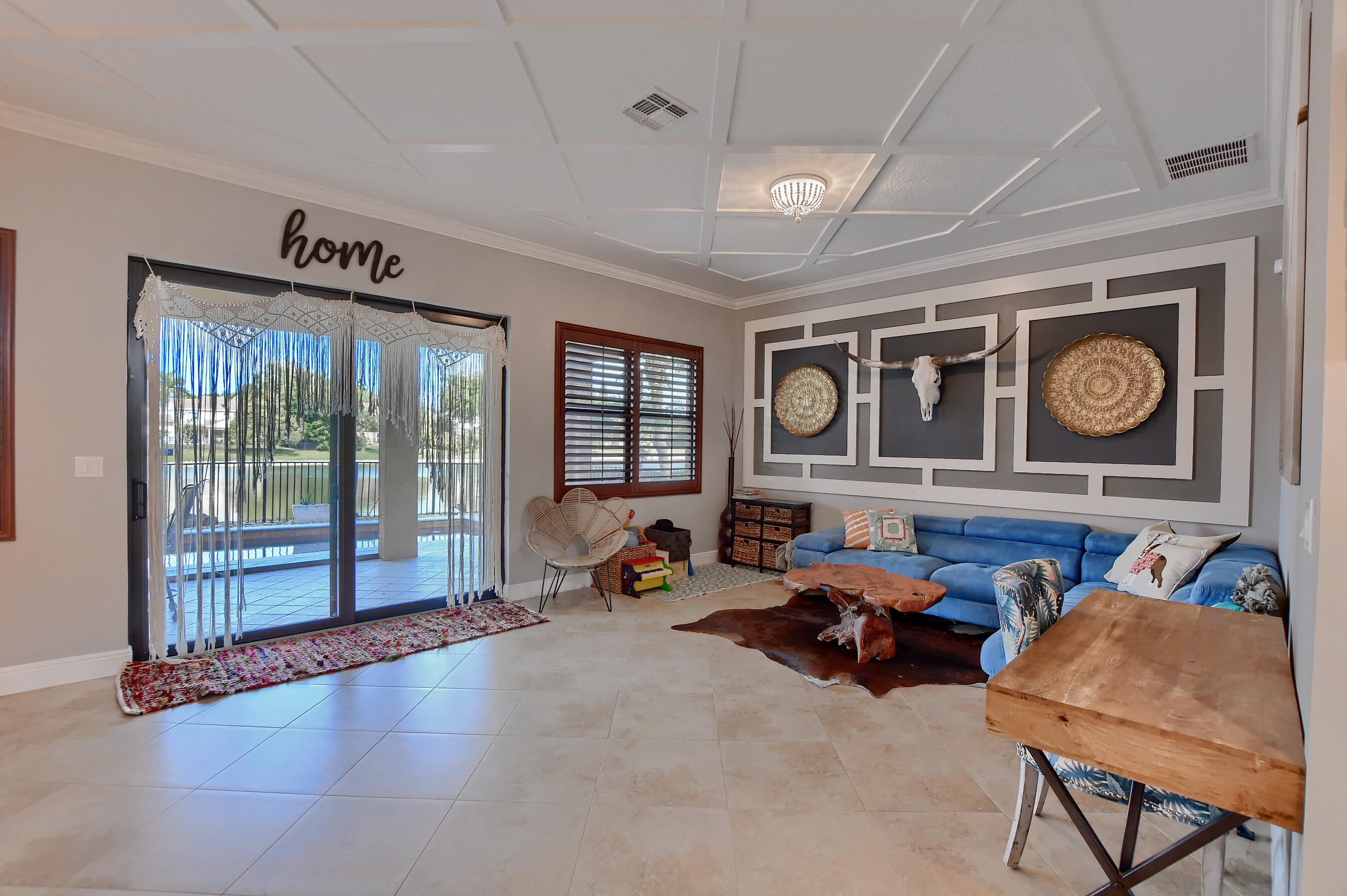 12161 Boca Reserve Lane Boca Raton, FL 33428 - Photo 15 of 53 a living room with furniture and a window