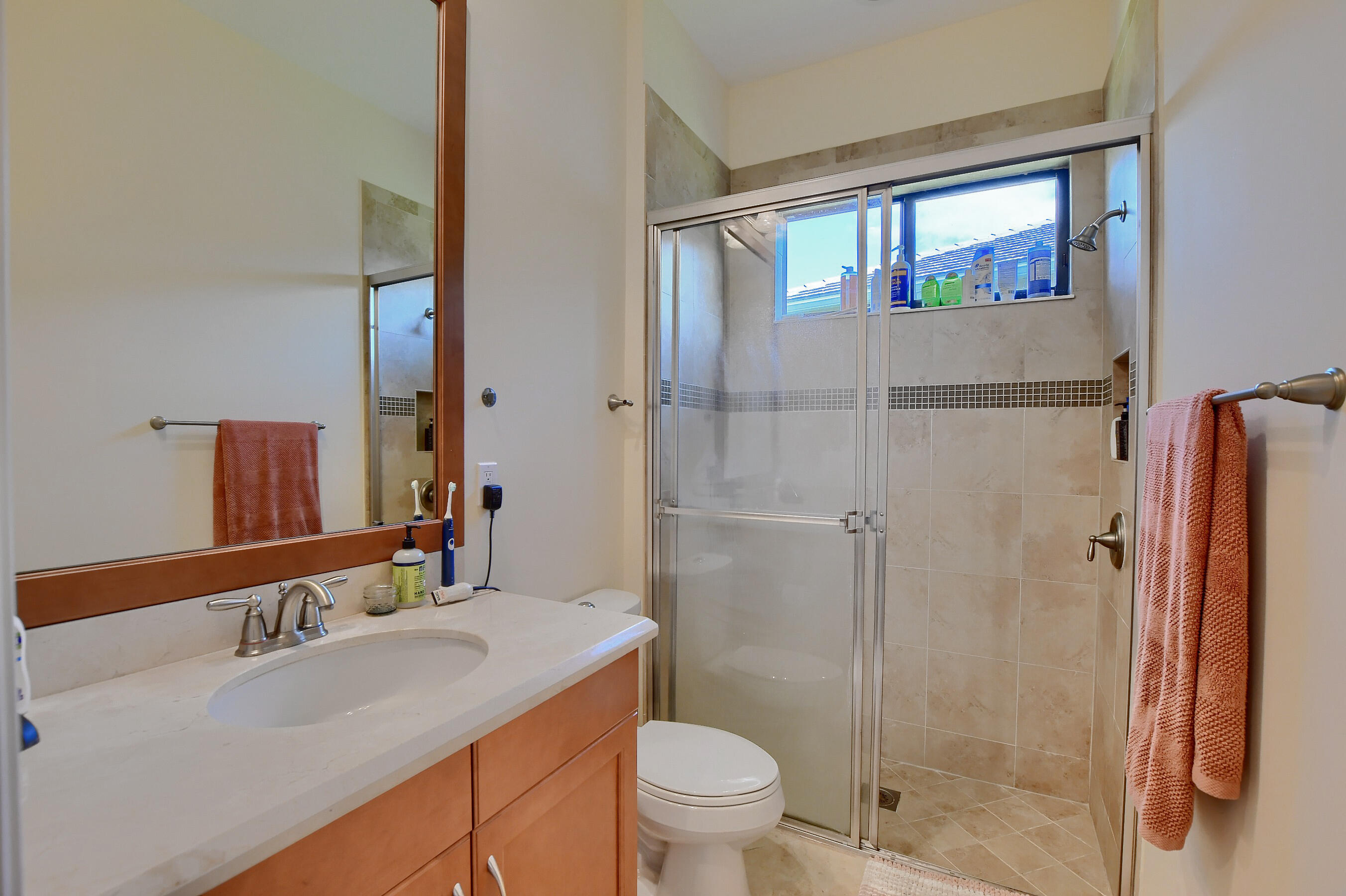 12161 Boca Reserve Lane Boca Raton, FL 33428 - Photo 22 of 53 a bathroom with a sink toilet and shower
