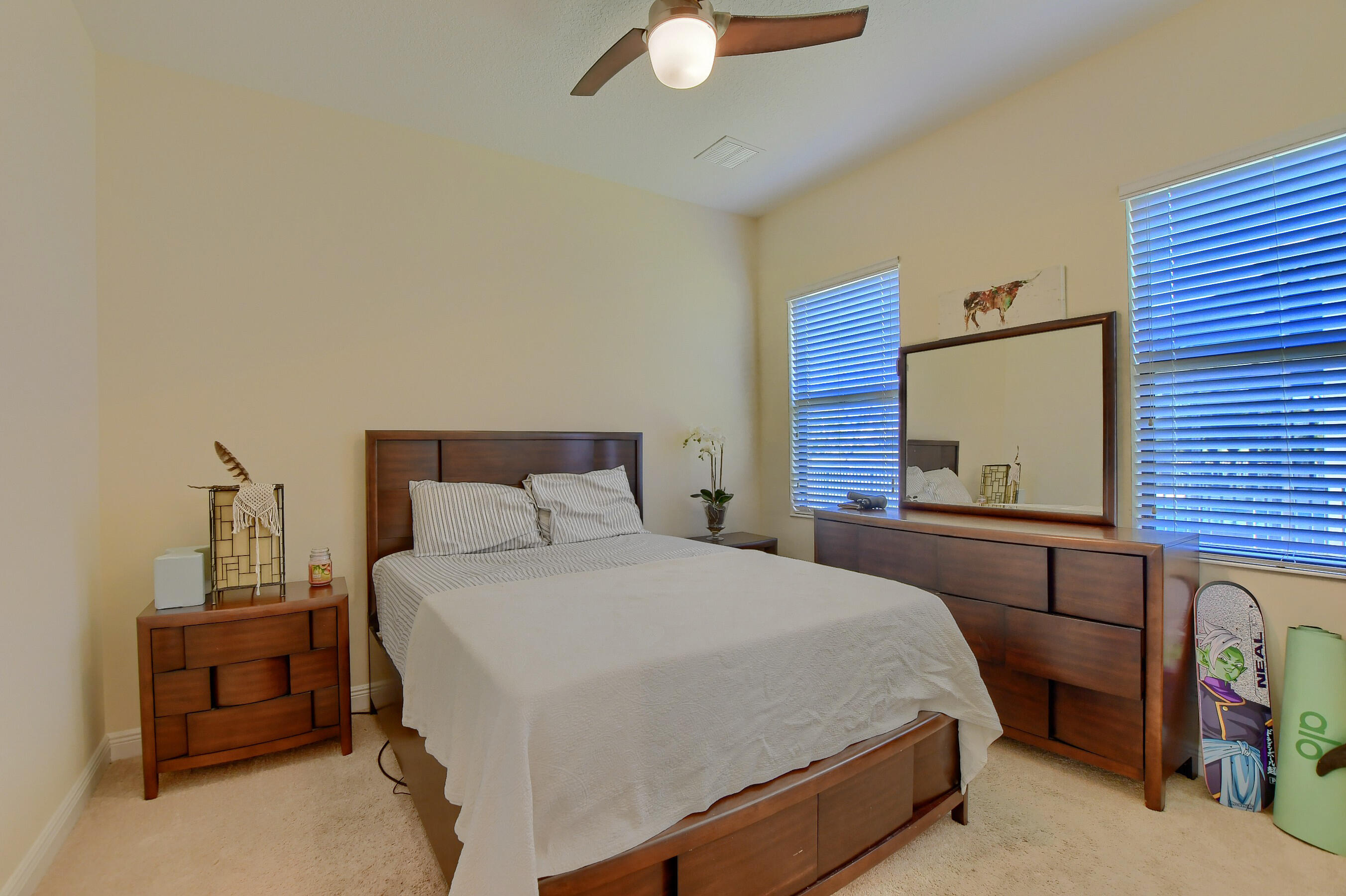 12161 Boca Reserve Lane Boca Raton, FL 33428 - Photo 23 of 53 a bedroom with a bed and a window