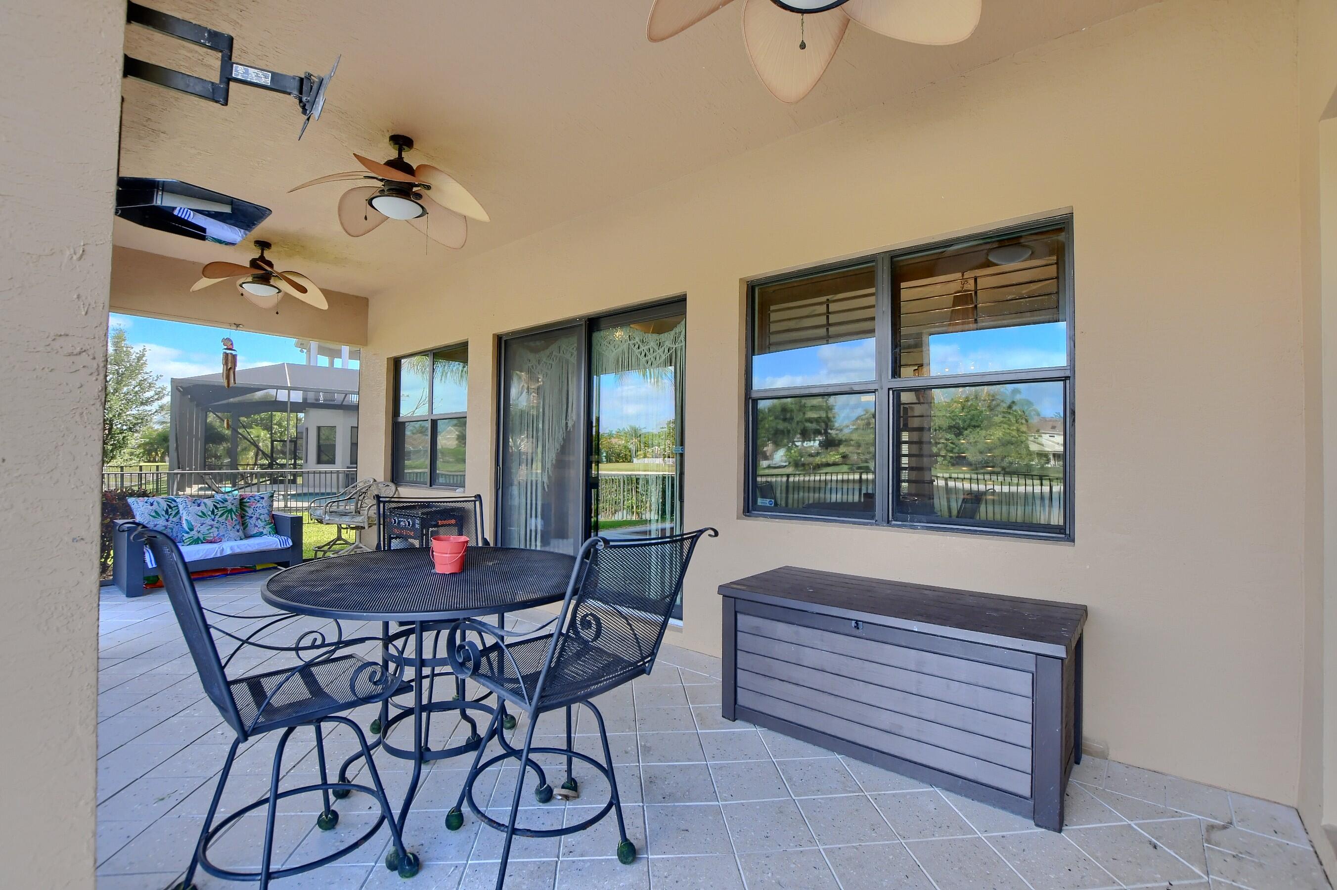 12161 Boca Reserve Lane Boca Raton, FL 33428 - Photo 49 of 53 a dining room with furniture and window