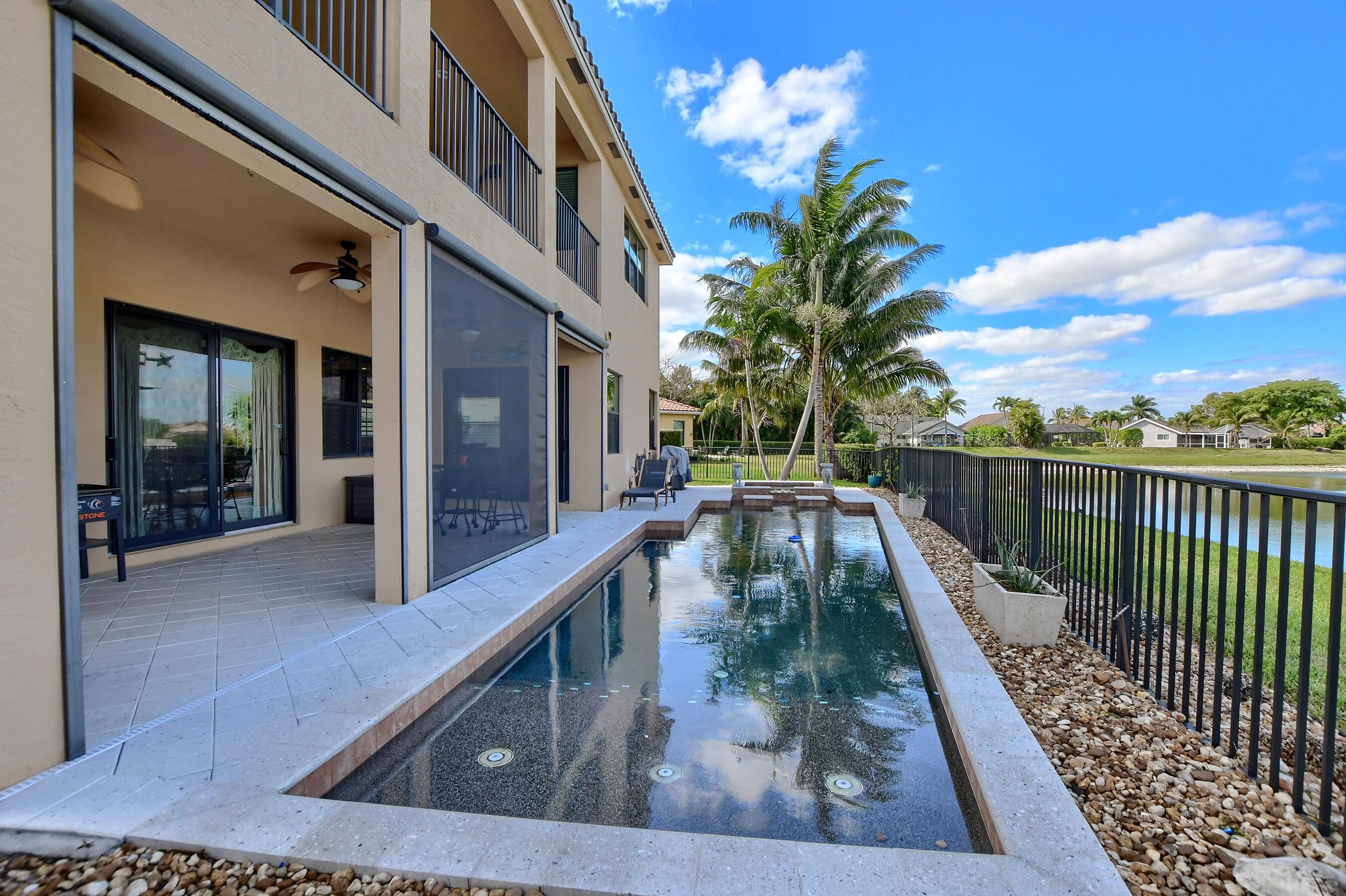 12161 Boca Reserve Lane Boca Raton, FL 33428 - Photo 51 of 53 a view of balcony with two potted plant and a potted plant