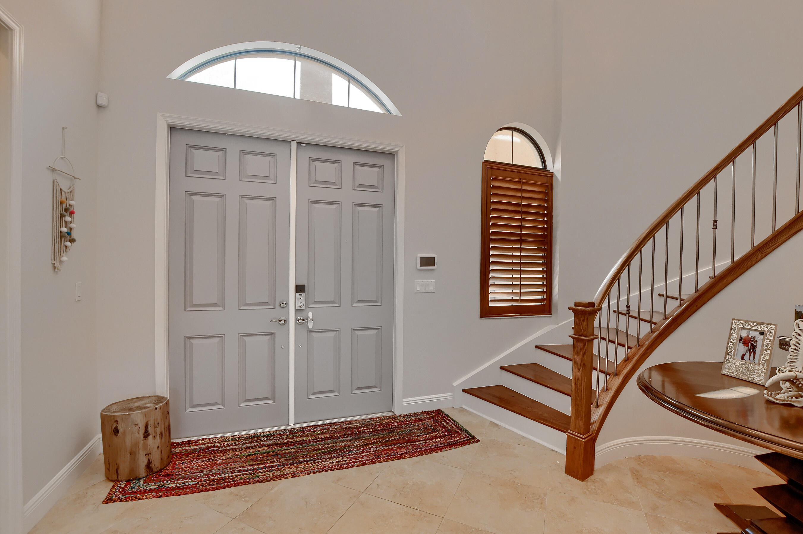 12161 Boca Reserve Lane Boca Raton, FL 33428 - Photo 7 of 53 a view of an entryway with wooden floor