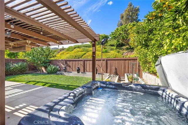 a view of backyard with small cabin