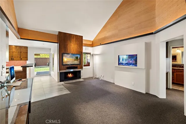 a view of a hallway with an outdoor space