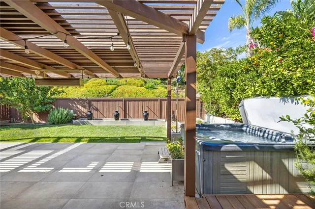 a view of a patio with a table chairs and a patio