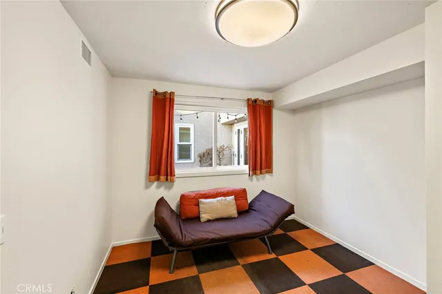 a room with furniture and a window