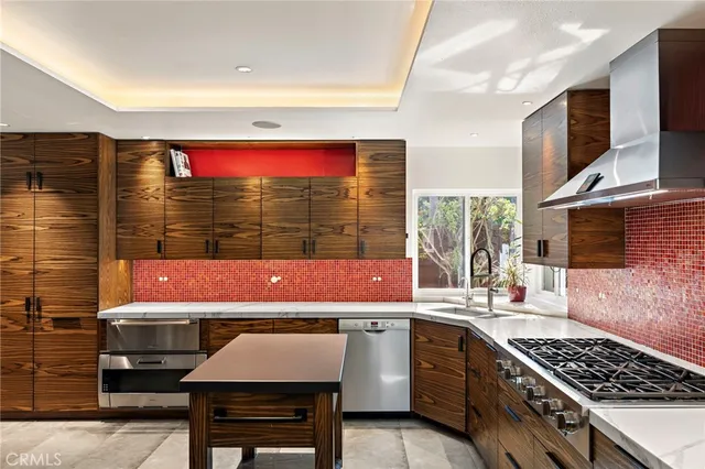 a kitchen with a stove and a microwave