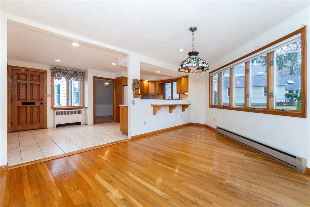 19 Homestead Road Lynnfield, MA 01940 - Photo 18 of 34 a view of a kitchen with granite countertop a refrigerator and a stove top oven