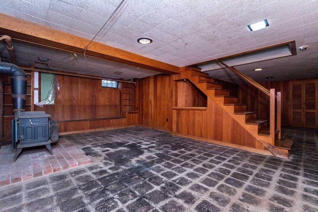 19 Homestead Road Lynnfield, MA 01940 - Photo 27 of 34 a view of a house with wooden walls