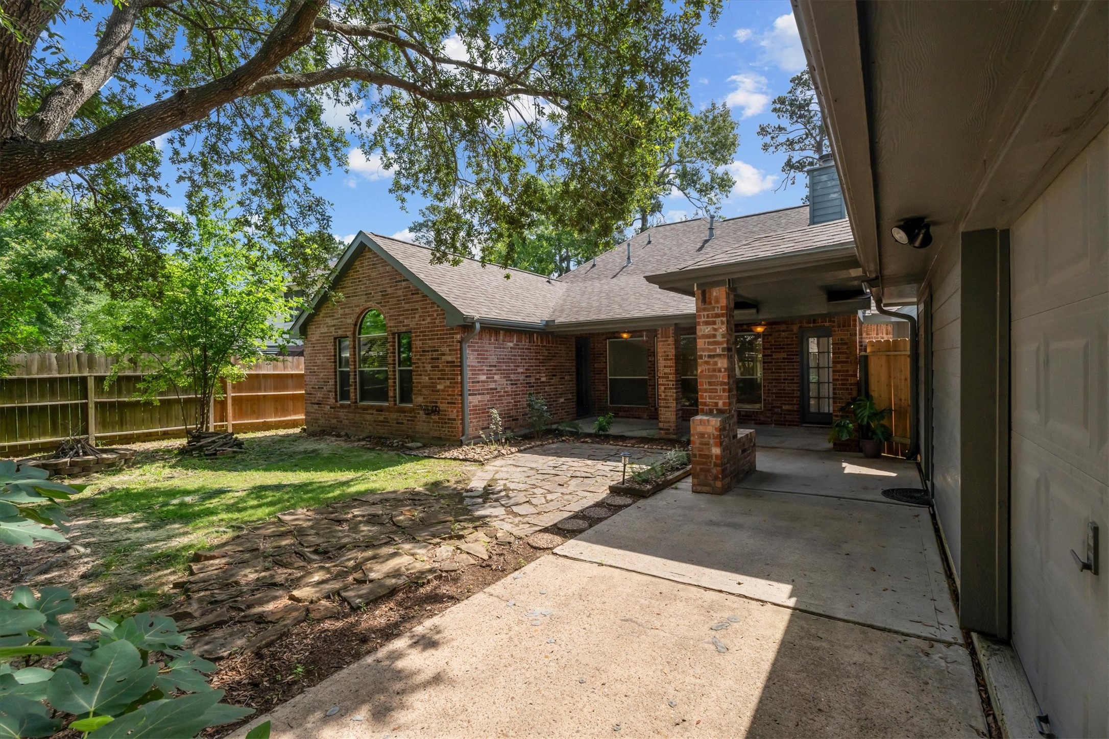 30111 Granum Drive Spring, TX 77386 - Photo 43 of 45 a view of a house with backyard and sitting area