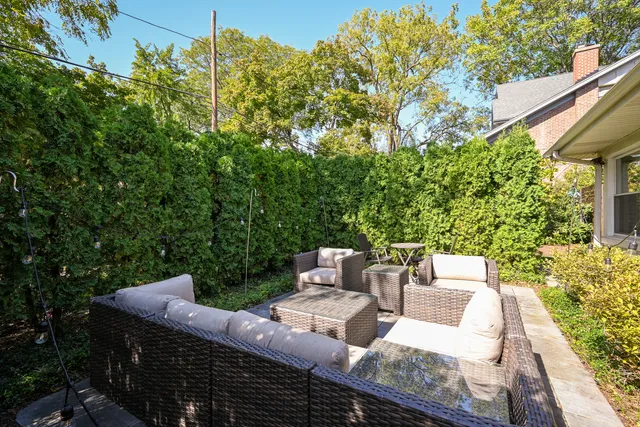 a view of a patio with furniture