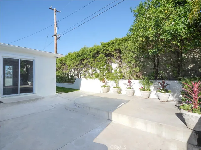 a view of balcony with furniture