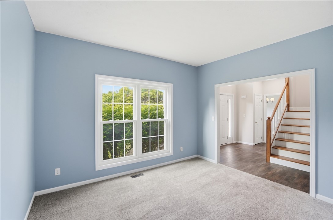 10 Chase Court Springboro, OH 45066 - Photo 11 of 75 This inviting room features soft carpeting and a bright window, offering a pleasant and serene atmosphere.