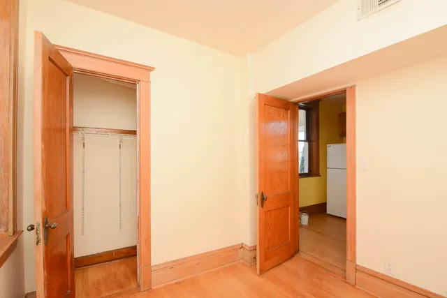 a view of a bathroom from a hallway