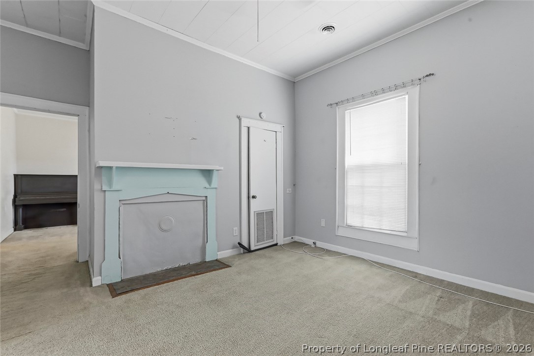 249 Nicholson Road Rockingham, NC 28379 - Photo 17 of 47 a view of an empty room with a window