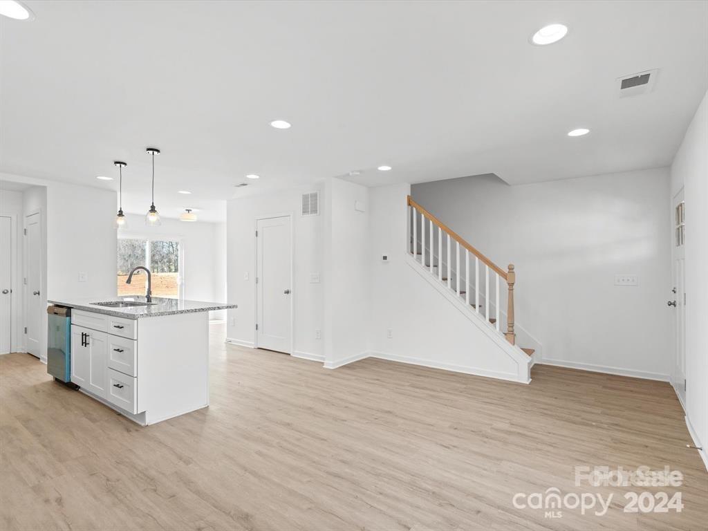 3799 Herman Sipe Road, Unit B Conover, NC 28613 - Photo 27 of 44 a view of kitchen with wooden floor and electronic appliances
