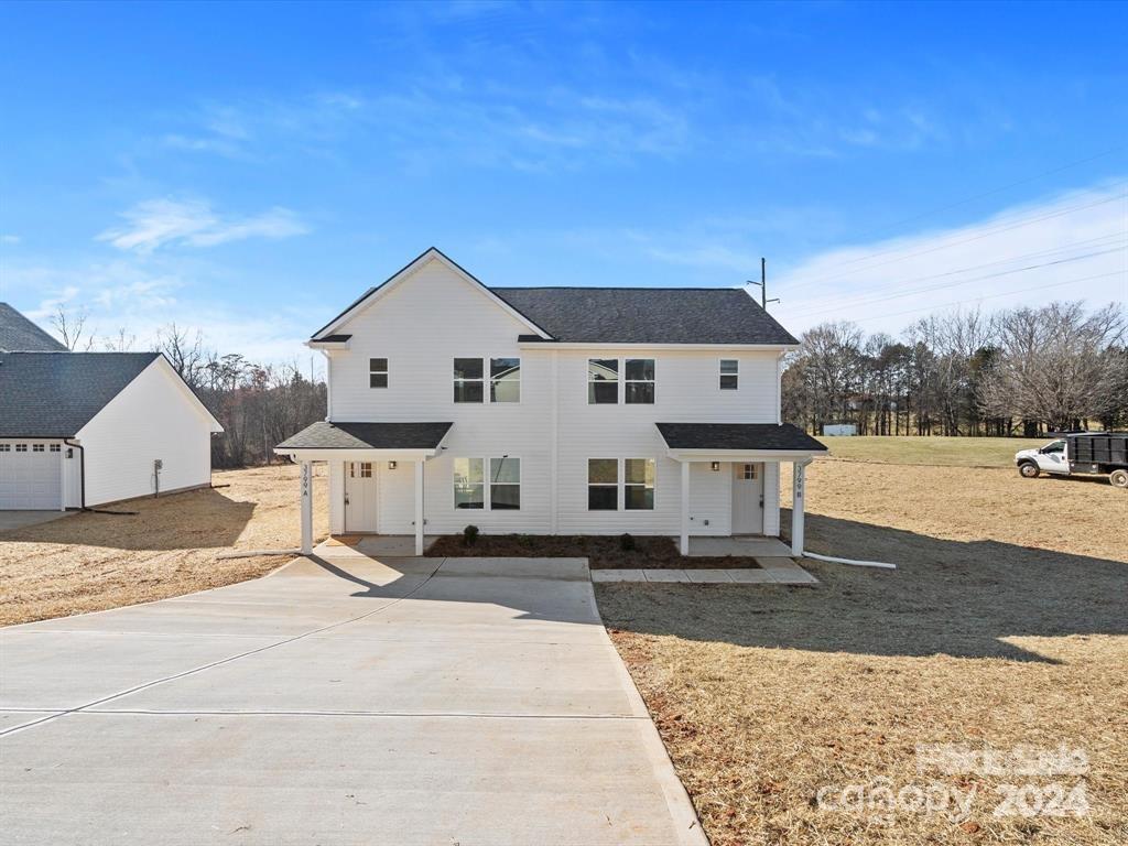 3799 Herman Sipe Road, Unit B Conover, NC 28613 - Photo 3 of 44 a front view of a house with a yard