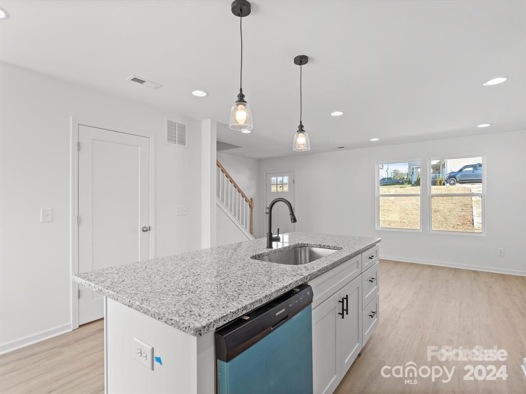 3799 Herman Sipe Road, Unit B Conover, NC 28613 - Photo 31 of 44 a kitchen with a sink a counter space and a window