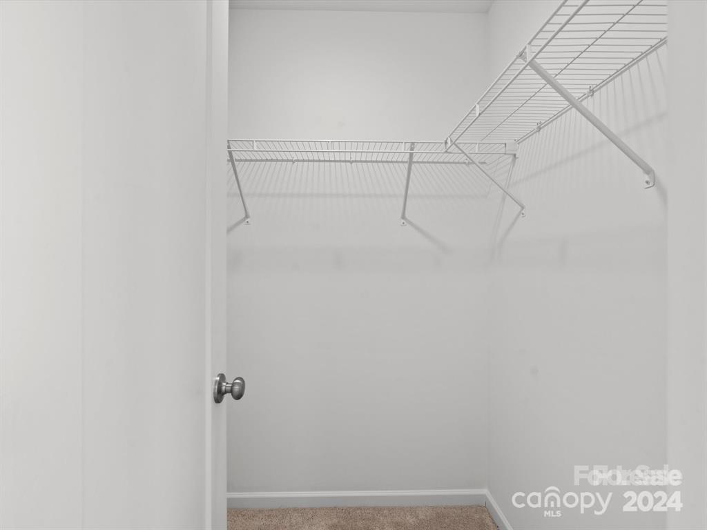 3799 Herman Sipe Road, Unit B Conover, NC 28613 - Photo 41 of 44 a view of small space with racks on the wall