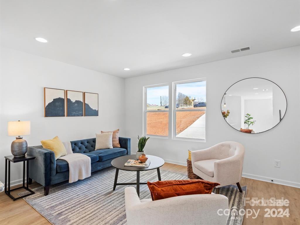 3799 Herman Sipe Road, Unit B Conover, NC 28613 - Photo 6 of 44 a living room with furniture and a large window