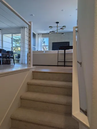 a view of entryway and hall with dining area