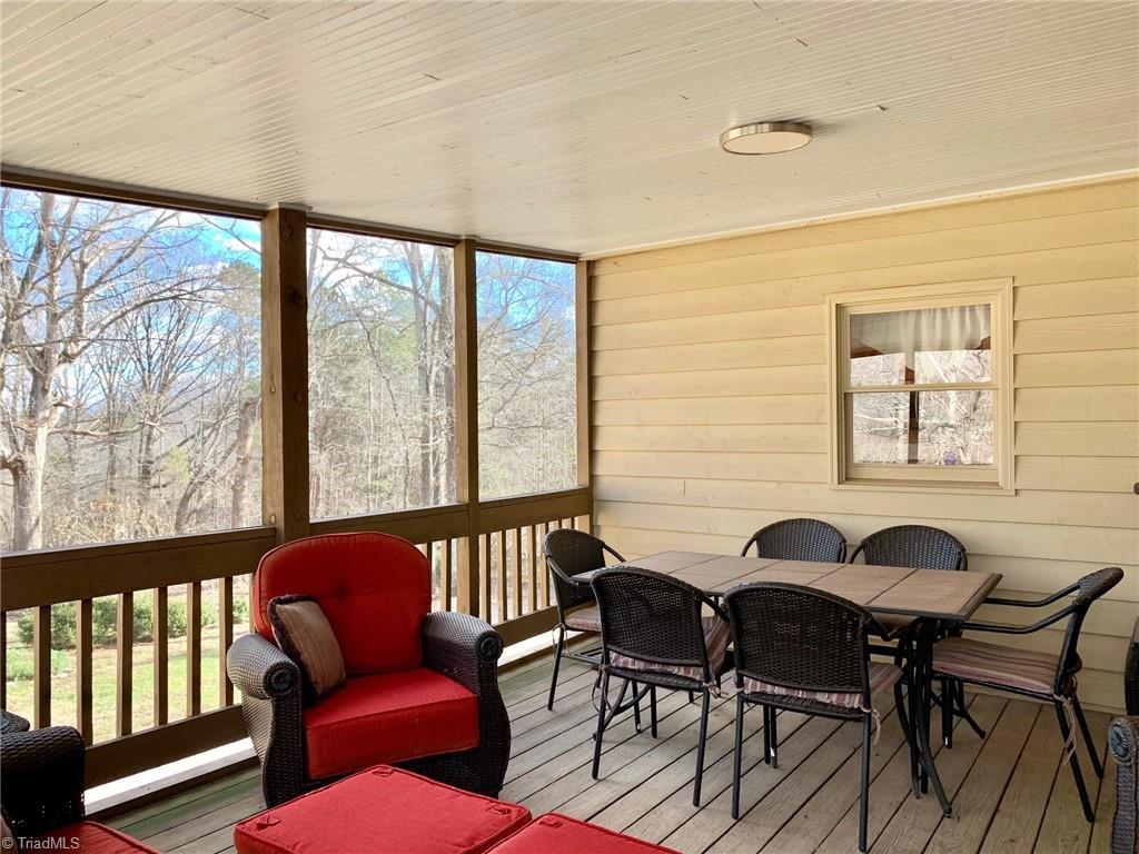 1876 Allred Road Lexington, NC 27292 - Photo 17 of 49 LOVE this serene screened porch! Window over kitchen sink looks out on the screened porch.