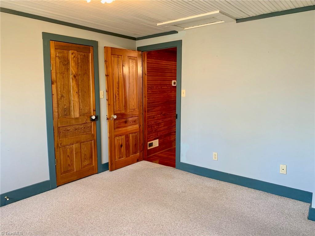 1876 Allred Road Lexington, NC 27292 - Photo 29 of 49 3rd bedroom has an additional alcove not figured in square footage...makes a nice ,roomy space and has walk-in closet