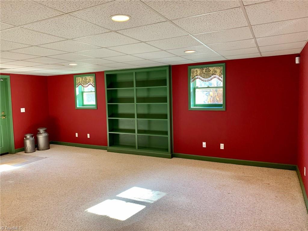 1876 Allred Road Lexington, NC 27292 - Photo 31 of 49 Rec room in basmt. .Outside entrance from lower level patio to back yard. Also has entrance to garage. This is a large fantastic space! Many uses!