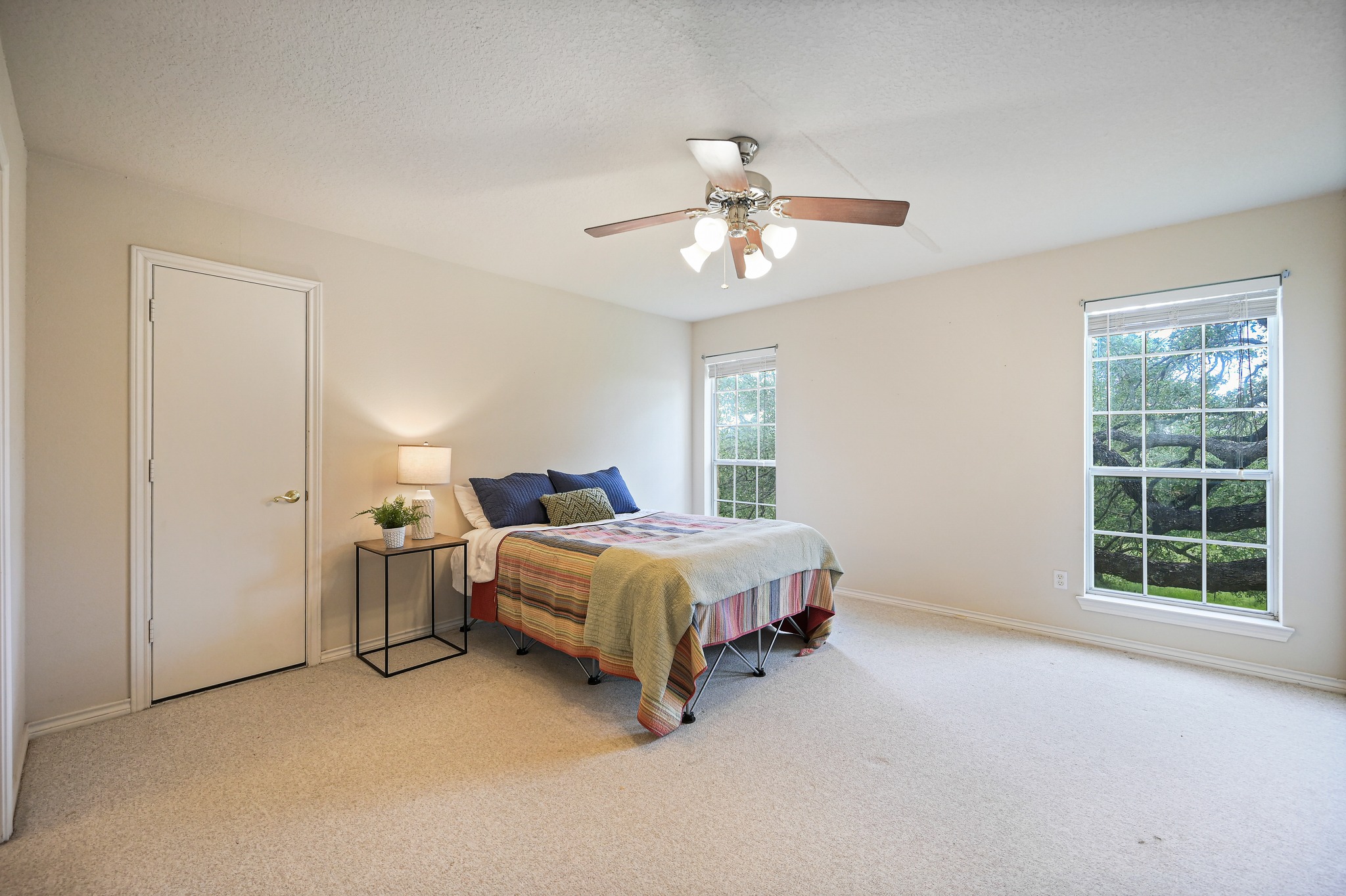 364 Nameless Road Driftwood, TX 78619 - Photo 22 of 32 Third bedroom with closet, attic storage access, two large windows and an adjoining bathroom.