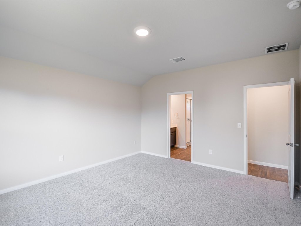 14408 Boquist Drive Pflugerville, TX 78660 - Photo 10 of 20 a view of an empty room